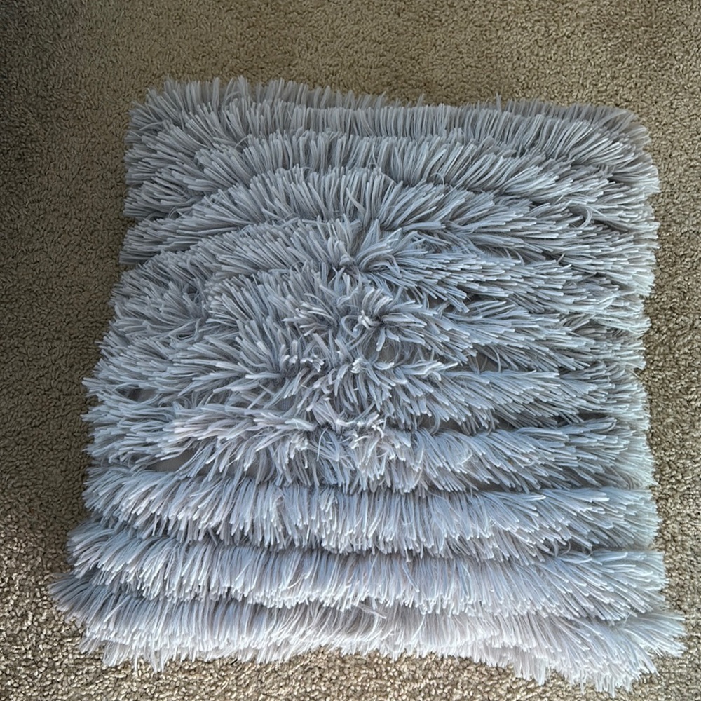 grey decorative pillow